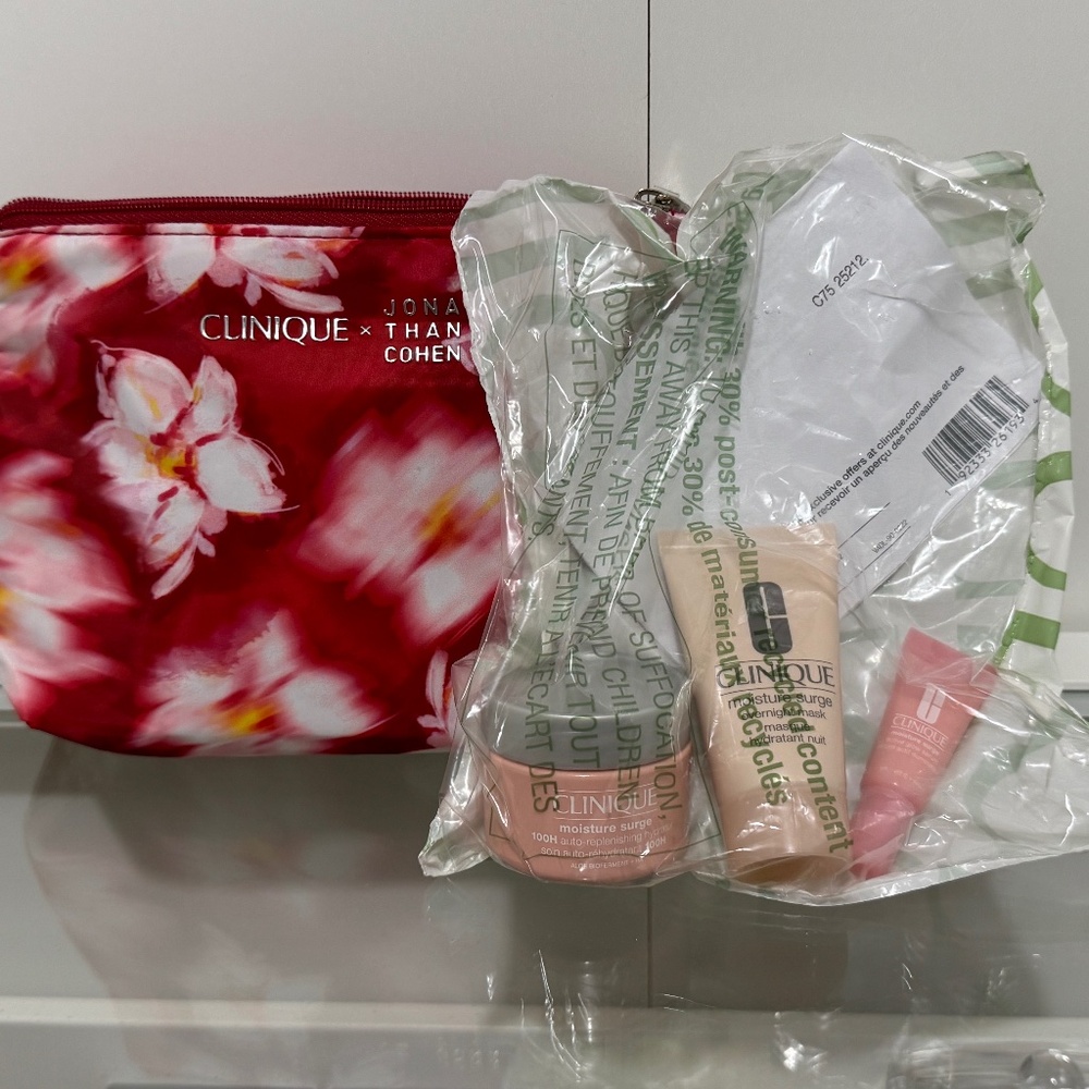 Brand new set of Clinique moisture surge cream, serum and mask